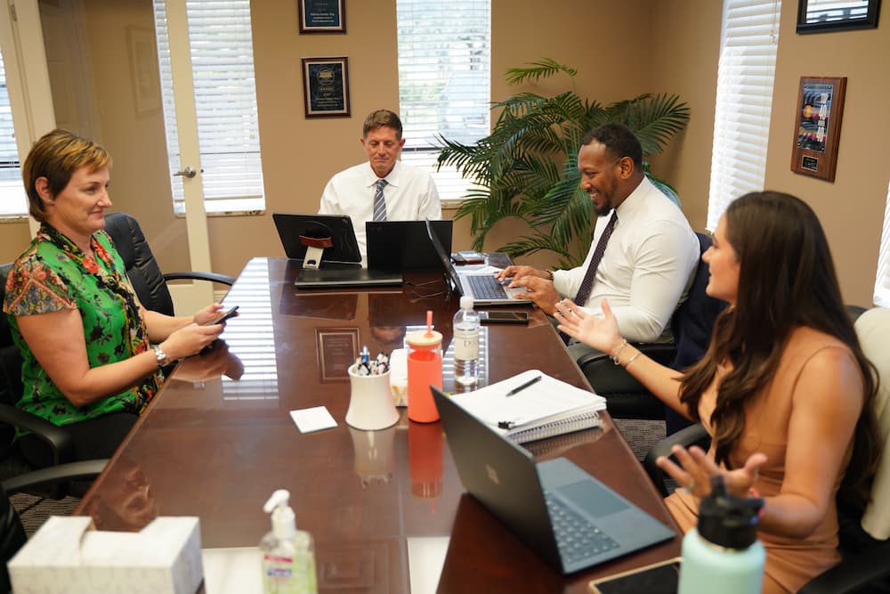 Attorney Stanley Gipe with his legal team at Dolman Law Group 